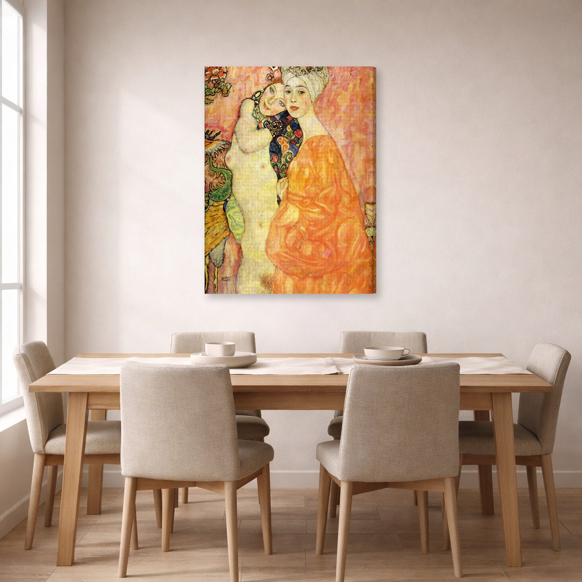 Gallery-wrapped canvas print of Gustav Klimt's 'Freundinnen' displayed on a wall in a dining room