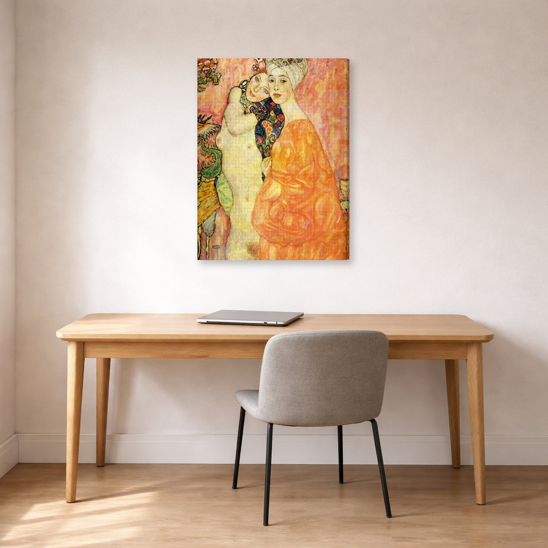 Gallery-wrapped canvas print of Gustav Klimt's 'Freundinnen' displayed on a wall in an office