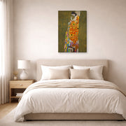 Gallery-wrapped canvas print of Gustav Klimt's 'Hope II 1907' displayed on a wall in a bedroom