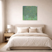 Gallery-wrapped canvas print of Gustav Klimt's 'Rose Bushes Under Trees' displayed on a wall in a bedroom
