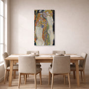 Gallery-wrapped canvas print of Gustav Klimt's 'Water Snakes II' displayed on a wall in a dining room