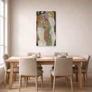 Unframed poster print of Gustav Klimt's 'Water Snakes II' displayed on a wall in a dining room