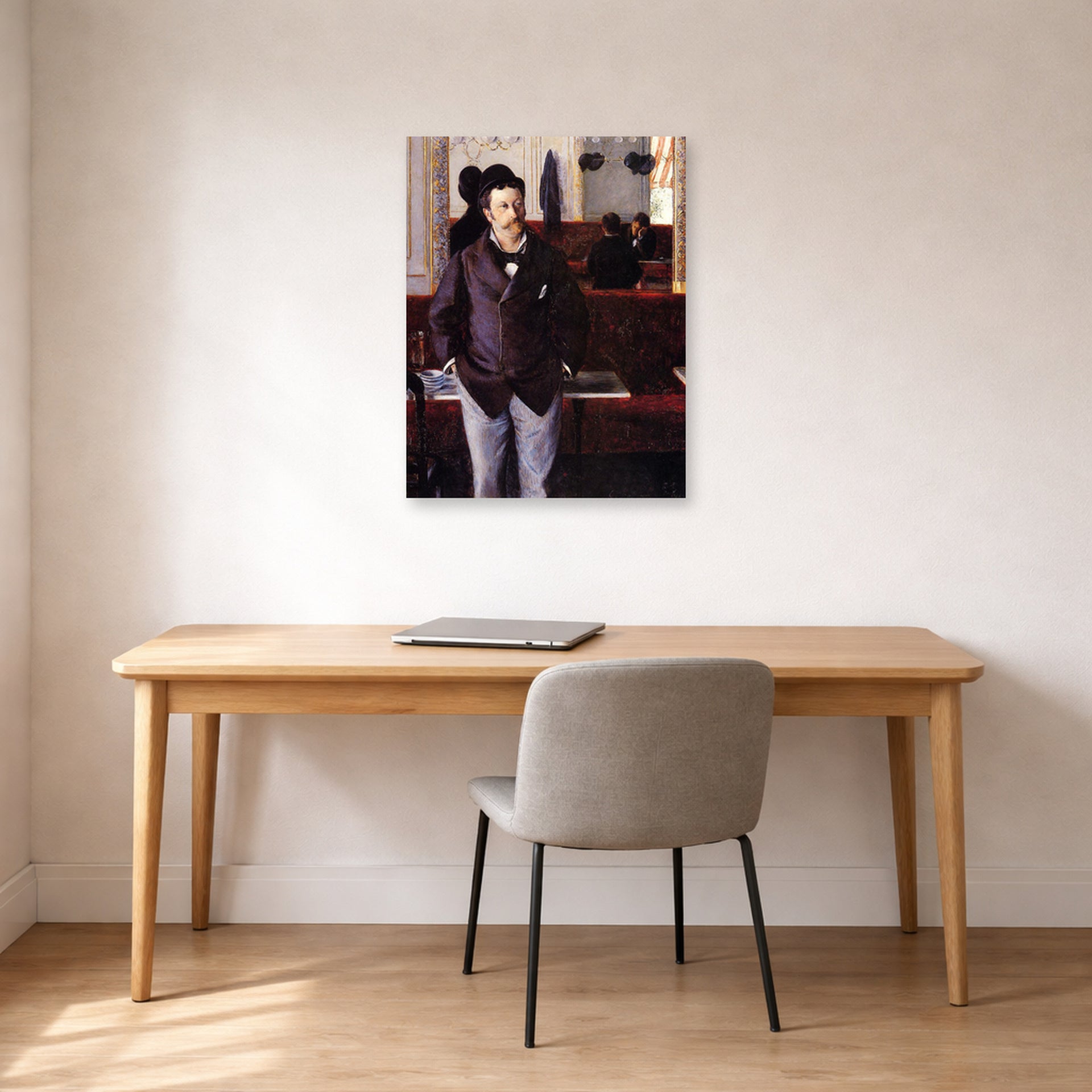 Unframed poster print of Gustave Caillebotte's Dans un café displayed on a wall in a office