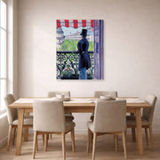 Gallery-wrapped canvas print of Gustave Caillebotte's L'homme au balcon, Boulevard Haussmann displayed on a wall in a dining