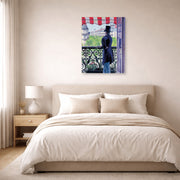 Unframed poster print of Gustave Caillebotte's L'homme au balcon, Boulevard Haussmann displayed on a wall in a bedroom