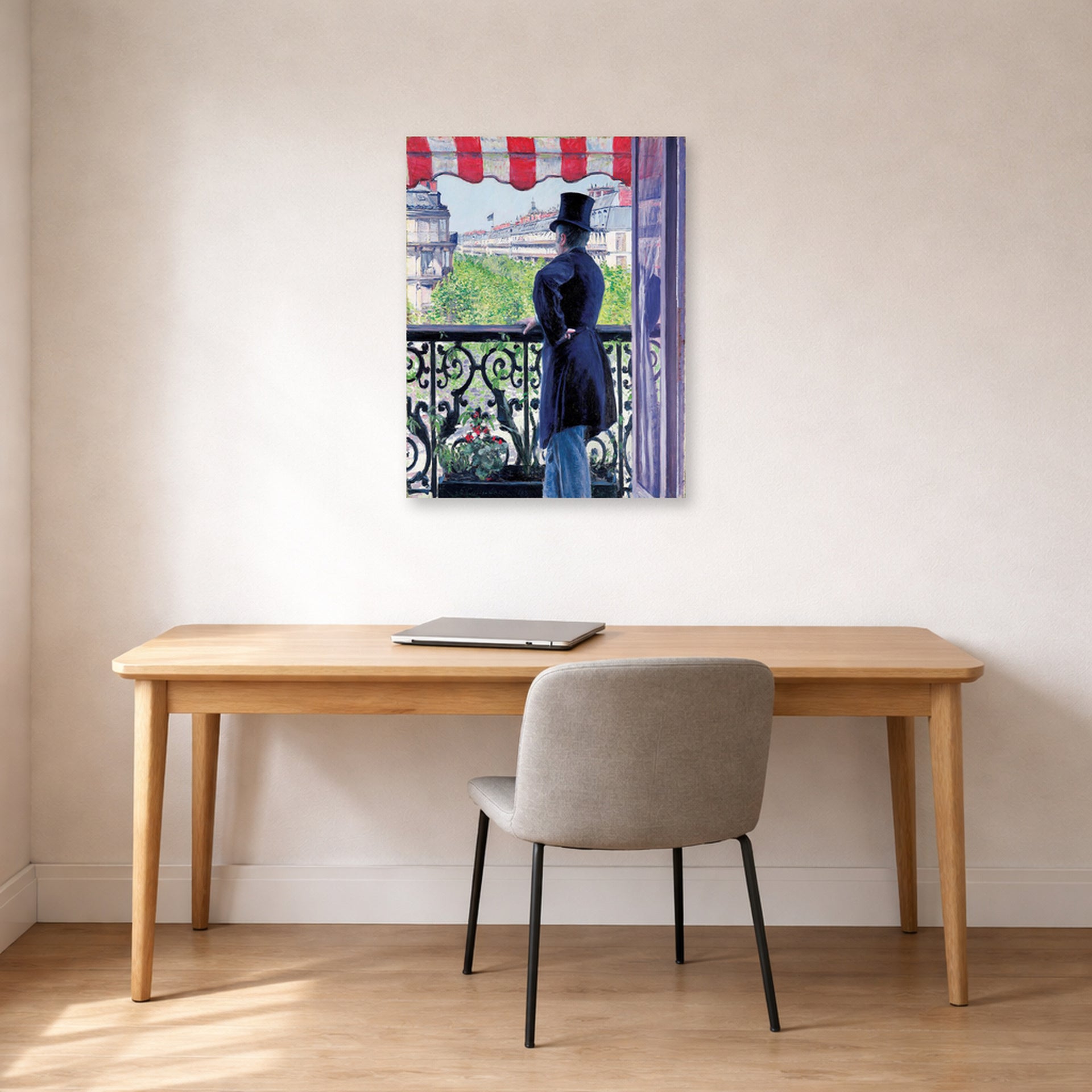 Unframed poster print of Gustave Caillebotte's L'homme au balcon, Boulevard Haussmann displayed on a wall in a office