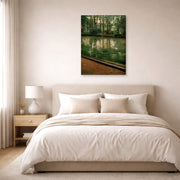 Gallery-wrapped canvas print of Gustave Caillebotte's L'Yerres, pluie displayed on a wall in a bedroom