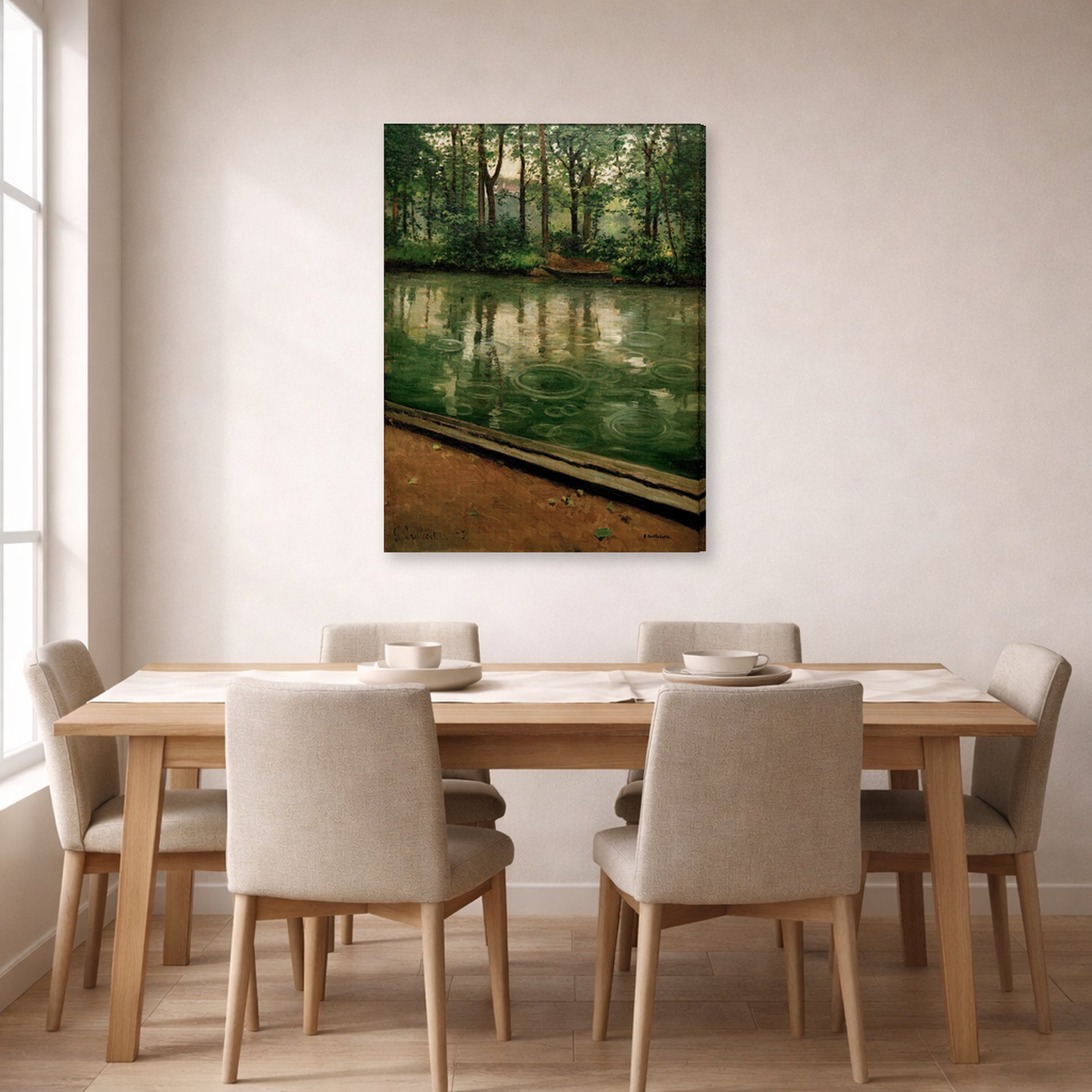 Gallery-wrapped canvas print of Gustave Caillebotte's L'Yerres, pluie displayed on a wall in a dining