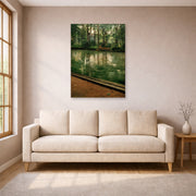 Unframed poster print of Gustave Caillebotte's L'Yerres, pluie displayed on a wall in a living room