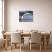 Unframed poster print of Gustave Caillebotte's Le Pont D Argenteuil Et La Seine displayed on a wall in a dining