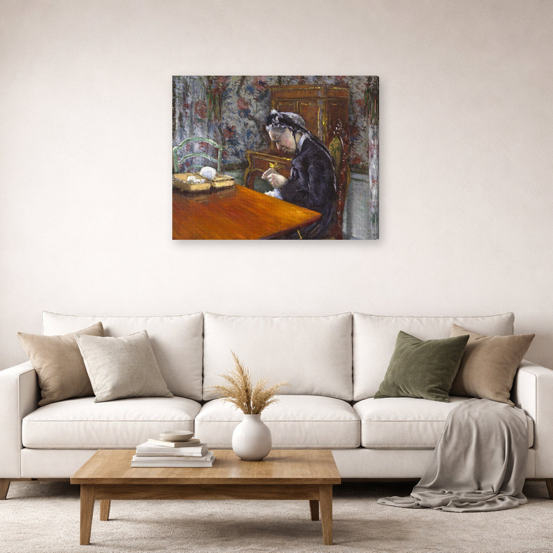 Gallery-wrapped canvas print of Gustave Caillebotte's Mademoiselle Boissière Knitting displayed on a wall in a living room