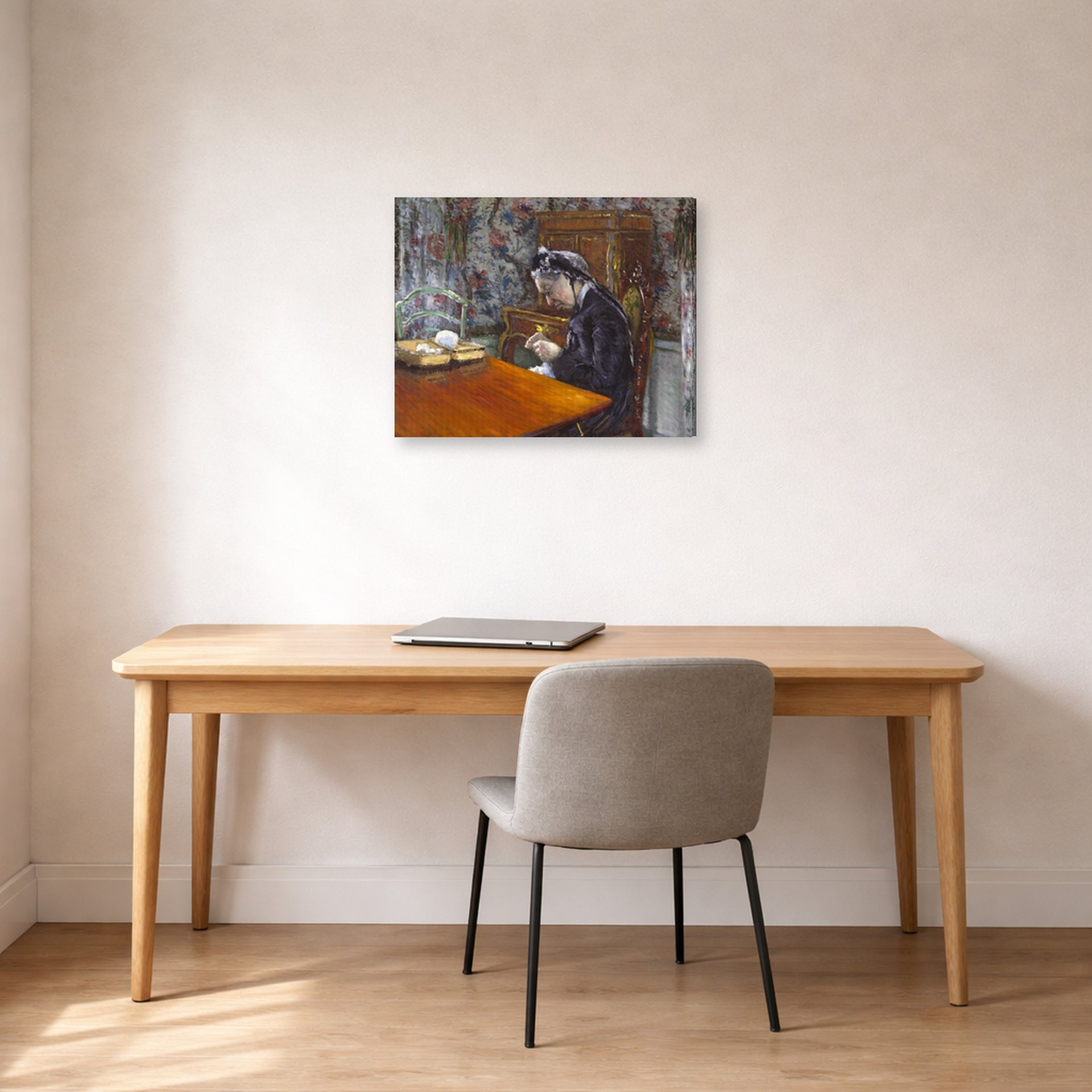 Gallery-wrapped canvas print of Gustave Caillebotte's Mademoiselle Boissière Knitting displayed on a wall in a office