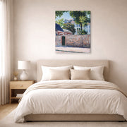 Gallery-wrapped canvas print of Gustave Caillebotte's Maisons À Argenteuil displayed on a wall in a bedroom