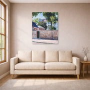 Unframed poster print of Gustave Caillebotte's Maisons À Argenteuil displayed on a wall in a living room