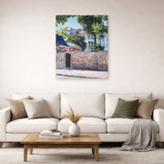 Unframed poster print of Gustave Caillebotte's Maisons À Argenteuil displayed on a wall in a living room