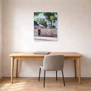 Unframed poster print of Gustave Caillebotte's Maisons À Argenteuil displayed on a wall in a office