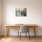 Unframed poster print of Gustave Caillebotte's Paris Street, Rainy Day displayed on a wall in a office