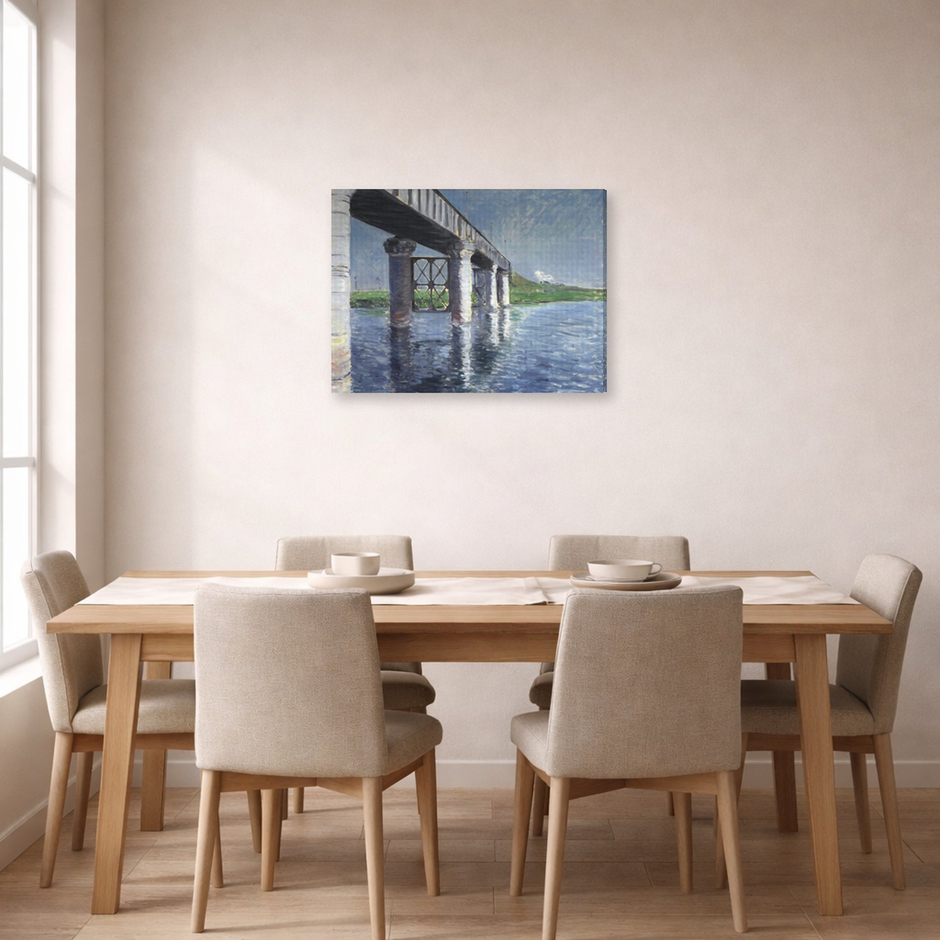 Gallery-wrapped canvas print of Gustave Caillebotte's The Seine and the Railroad Bridge at Argenteuil displayed on a wall in a dining