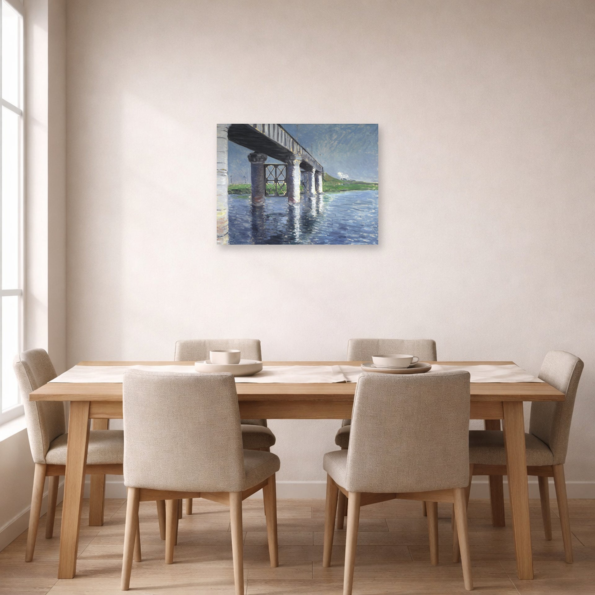 Unframed poster print of Gustave Caillebotte's The Seine and the Railroad Bridge at Argenteuil displayed on a wall in a dining