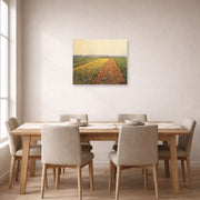 Unframed poster print of Gustave Caillebotte's The Yellow Fields at Gennevilliers displayed on a wall in a dining