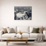 Gallery-wrapped canvas print of Gustave Caillebotte's Vue de toits (Effet de neige) displayed on a wall in a living room