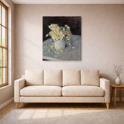 Gallery-wrapped canvas print of Gustave Caillebotte's Yellow Roses in a Vase displayed on a wall in a living room