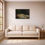 Gallery-wrapped canvas print of Gustave Courbet's Nu Couche displayed on a wall in a living room