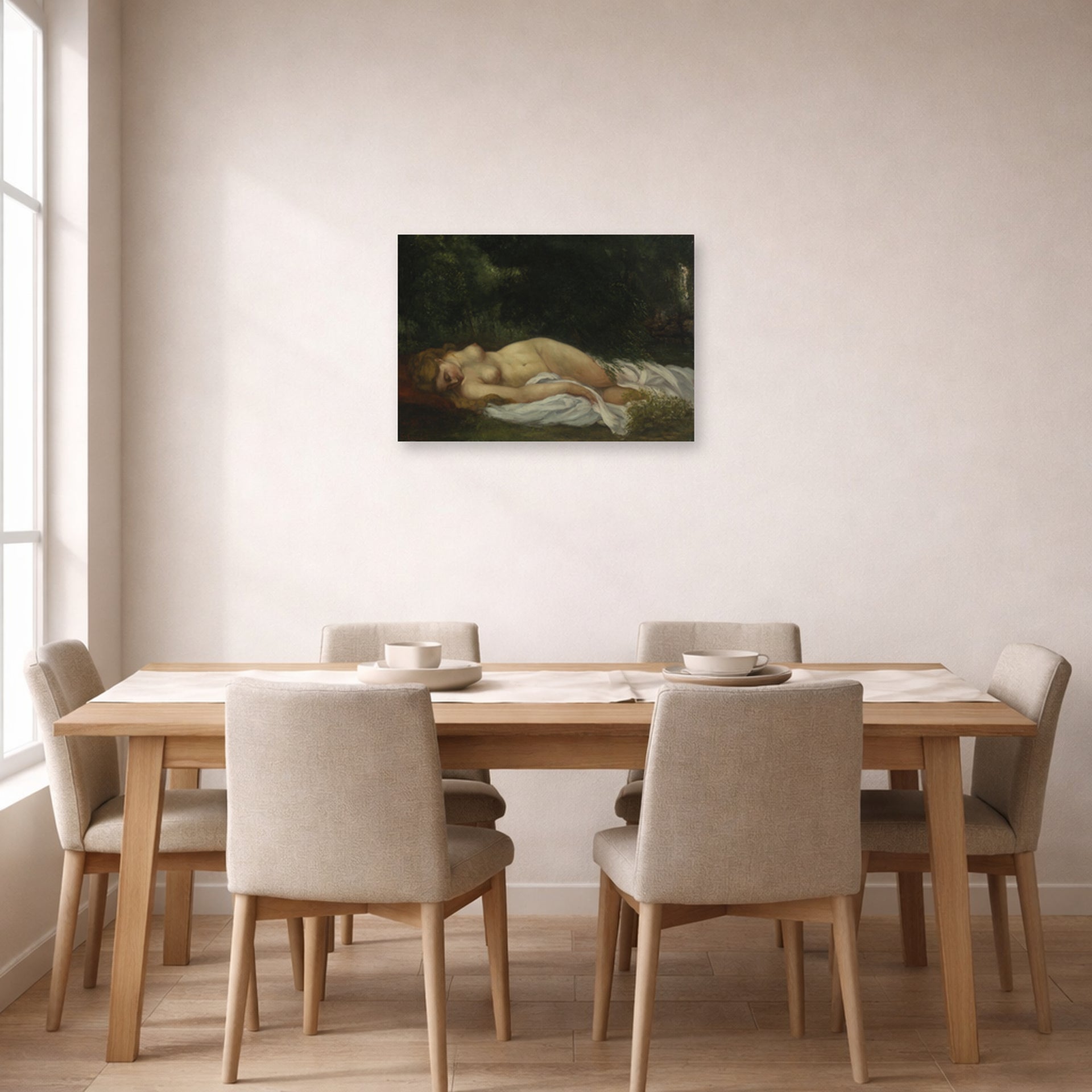 Unframed poster print of Gustave Courbet's Nu Couche displayed on a wall in a dining room