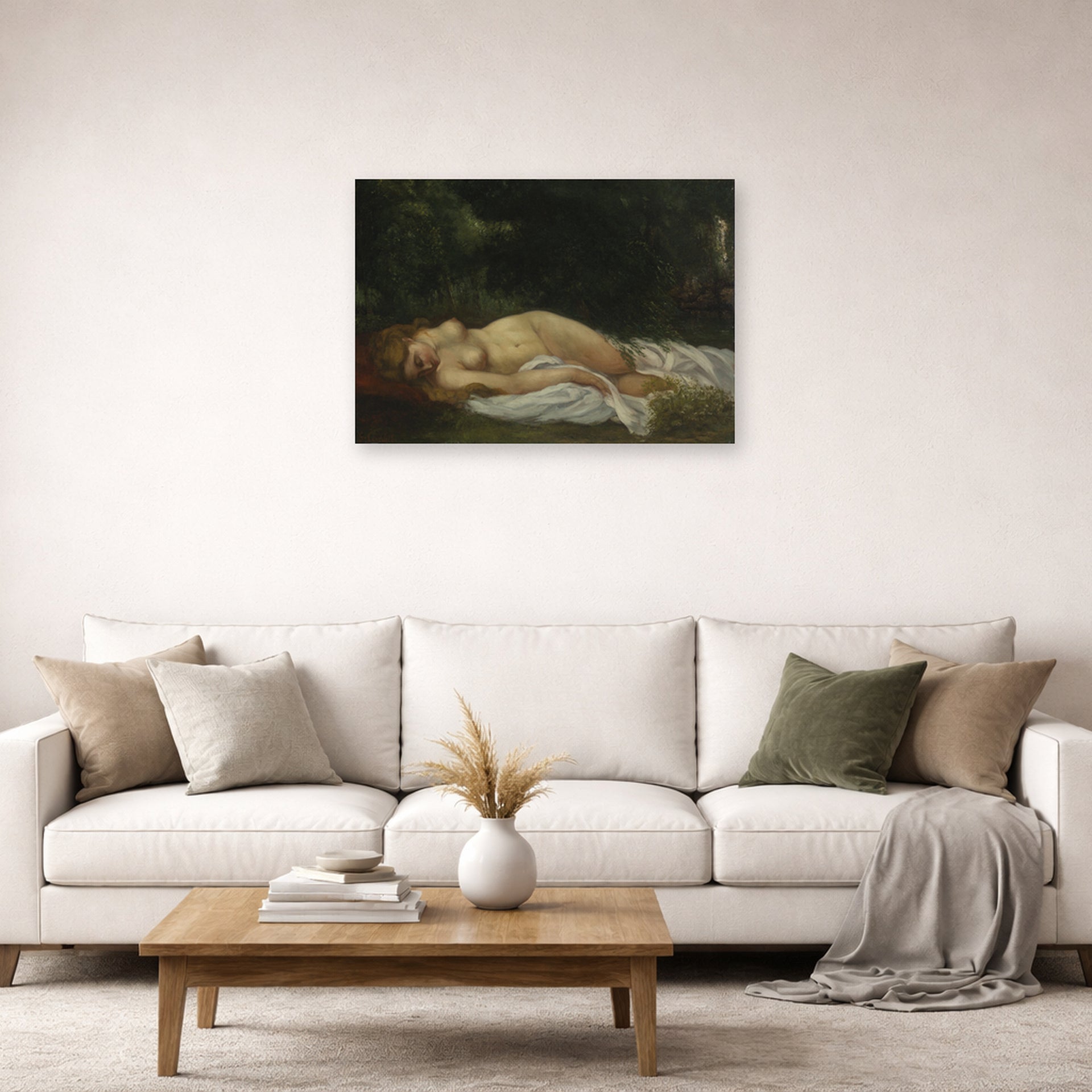 Unframed poster print of Gustave Courbet's Nu Couche displayed on a wall in a living room