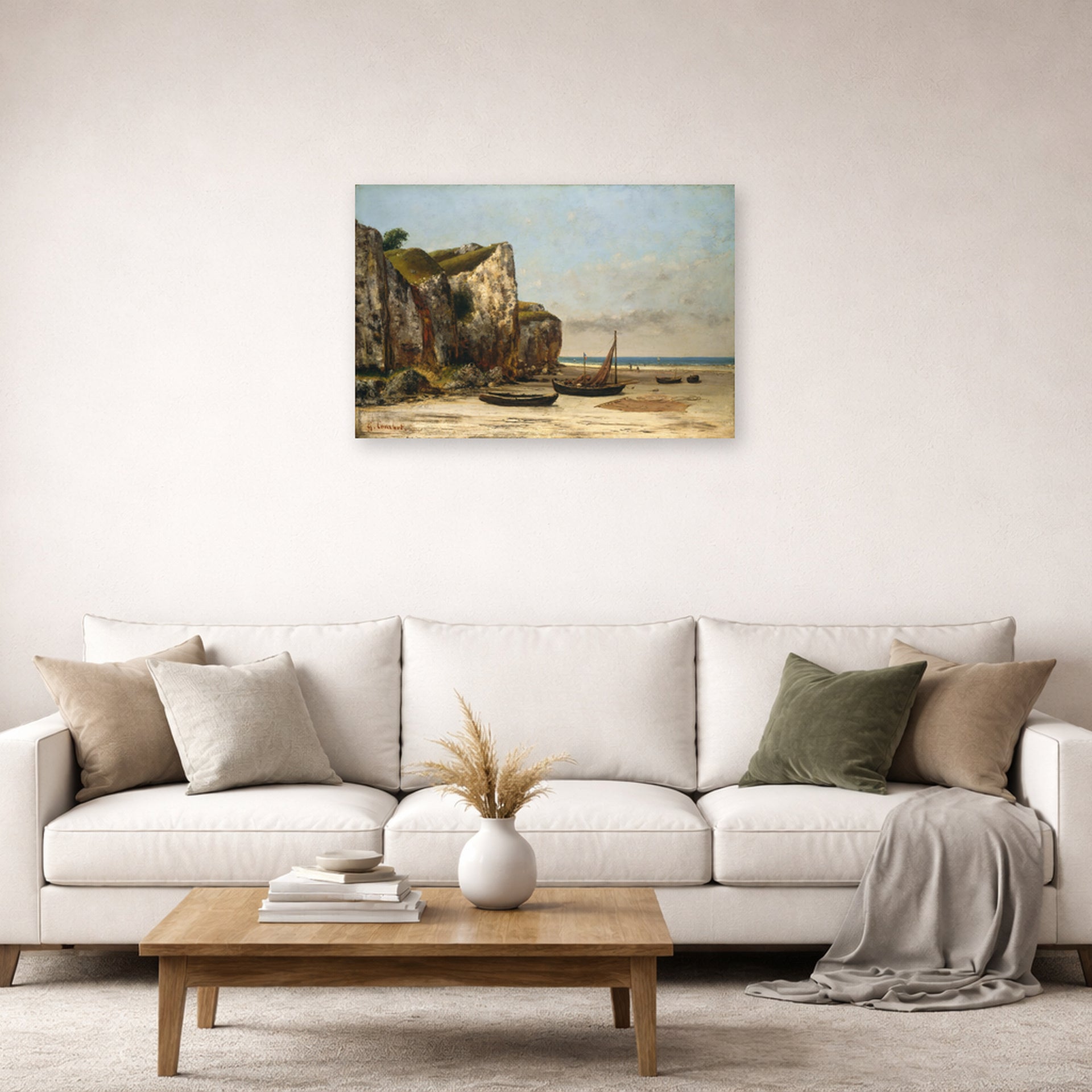 Unframed poster print of Gustave Courbet's Plage de Normandie displayed on a wall in a living room