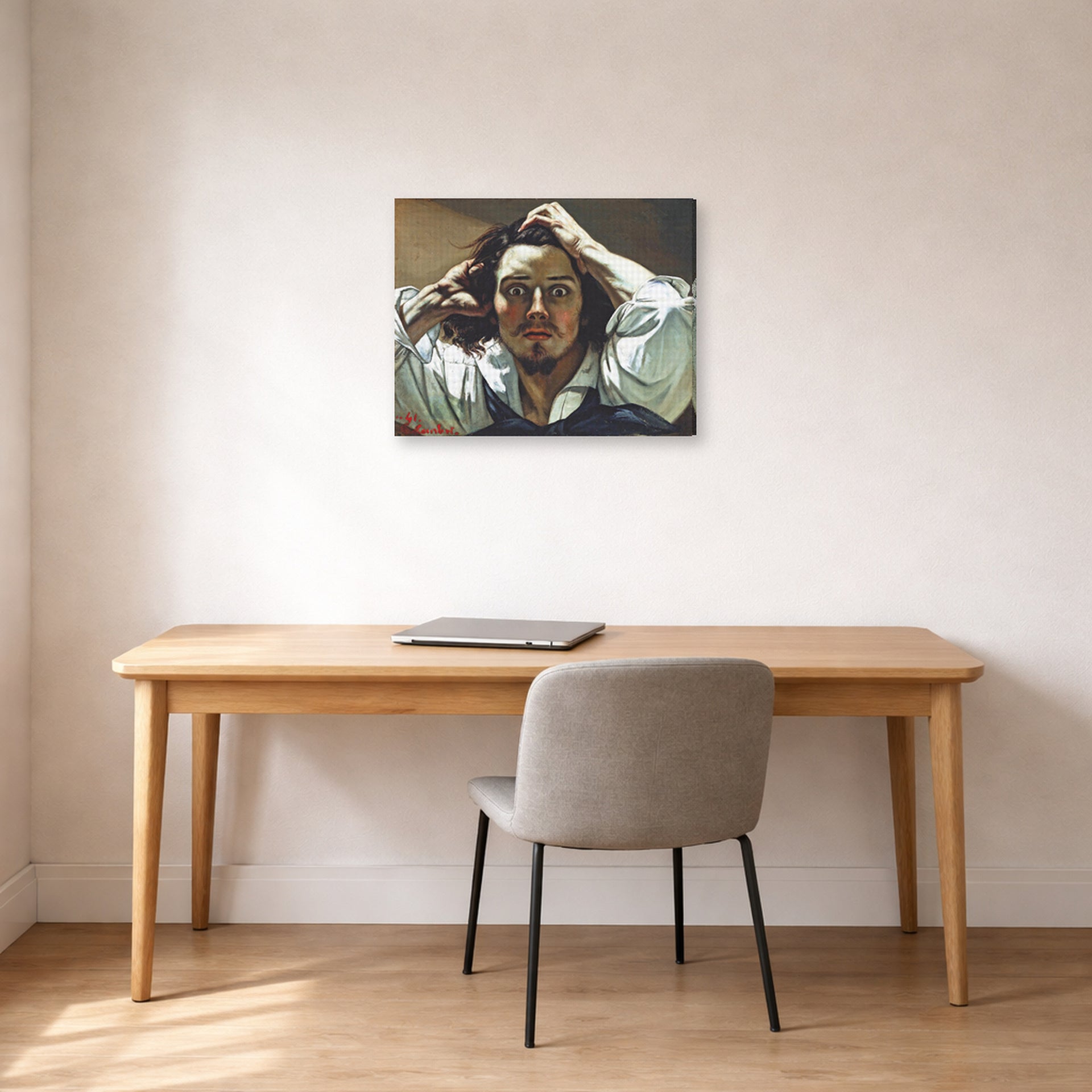 Gallery-wrapped canvas print of Gustave Courbet's Selfportrait (The Desperate Man) displayed on a wall in a home office
