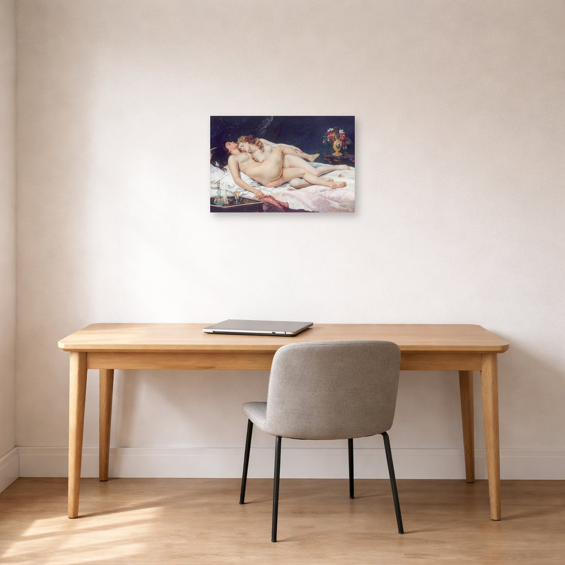 Unframed poster print of Gustave Courbet's Sleep displayed on a wall in a home office