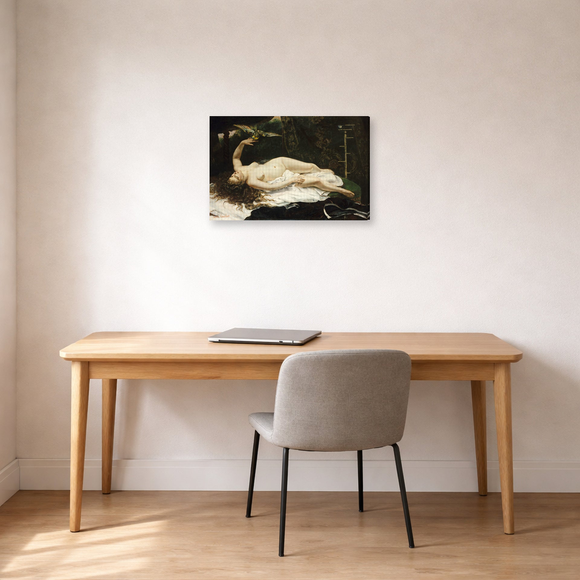 Gallery-wrapped canvas print of Gustave Courbet's Woman with a Parrot displayed on a wall in a home office