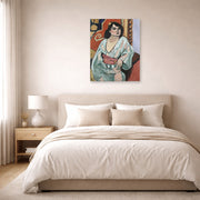 Unframed poster print of Henri Matisse's Algerian Woman displayed above a bed in a bedroom