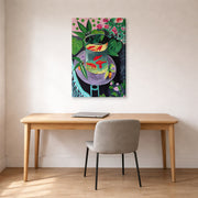Gallery-wrapped canvas print of Henri Matisse's Artist and Goldfish hanging in a home office