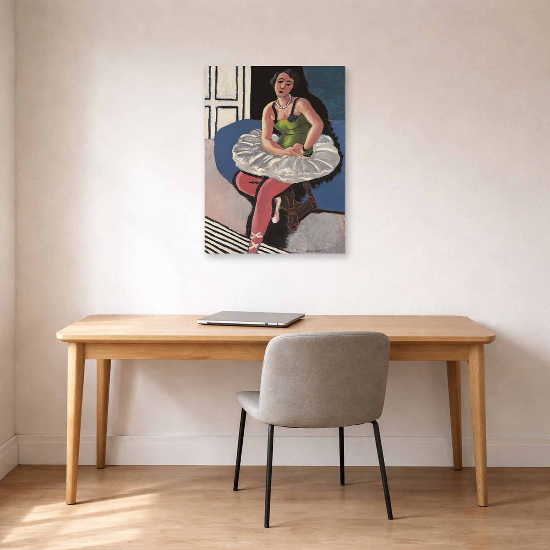 Unframed poster print of Henri Matisse's Ballet Dancer Seated on a Stool displayed in a home office