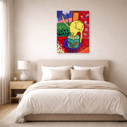 Gallery-wrapped canvas print of Henri Matisse's Chat Aux Poissons Rouges hanging above a bed in a bedroom