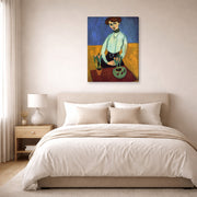 Gallery-wrapped canvas print of Henri Matisse's Girl with Tulips hanging above a bed in a bedroom
