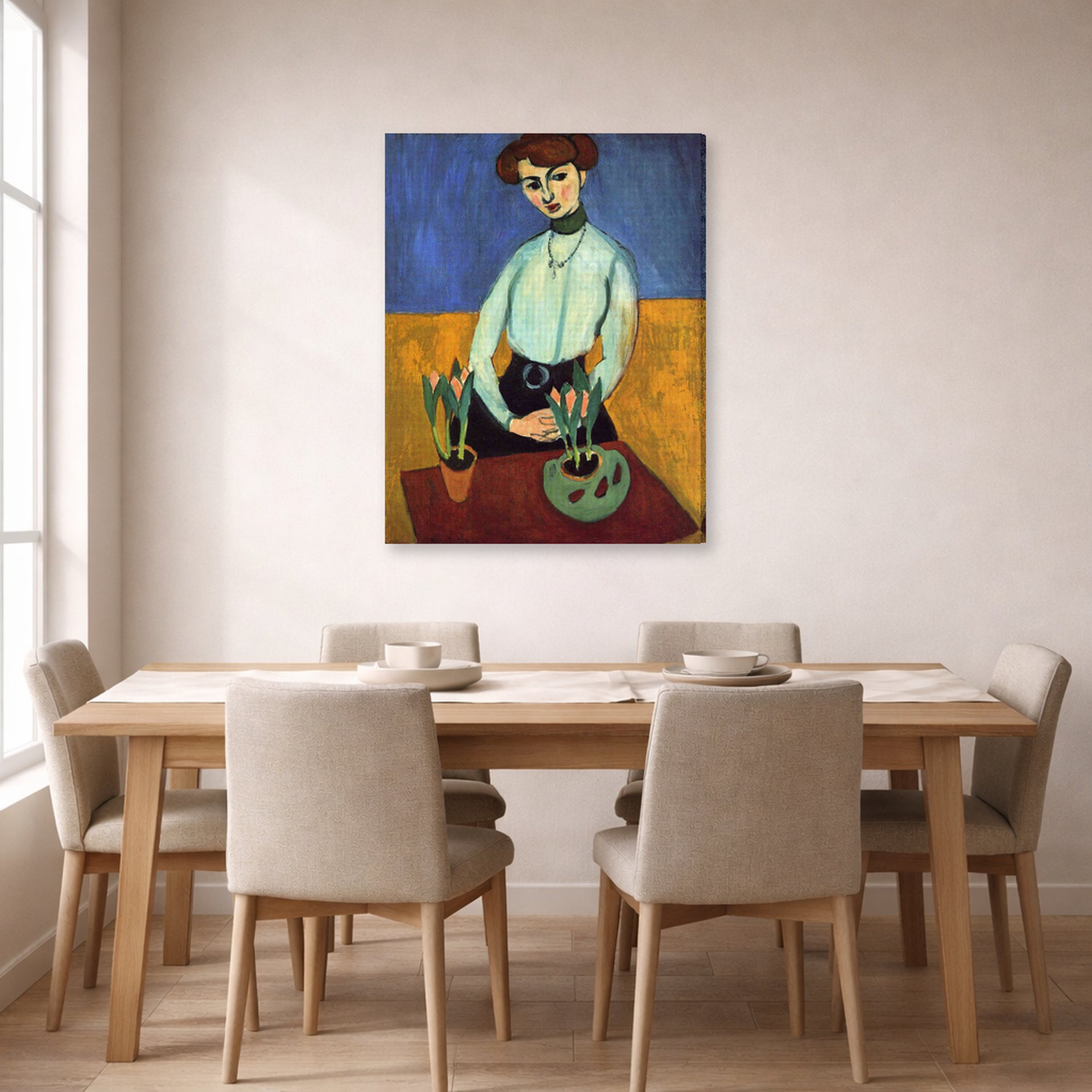 Gallery-wrapped canvas print of Henri Matisse's Girl with Tulips hanging on a dining room wall
