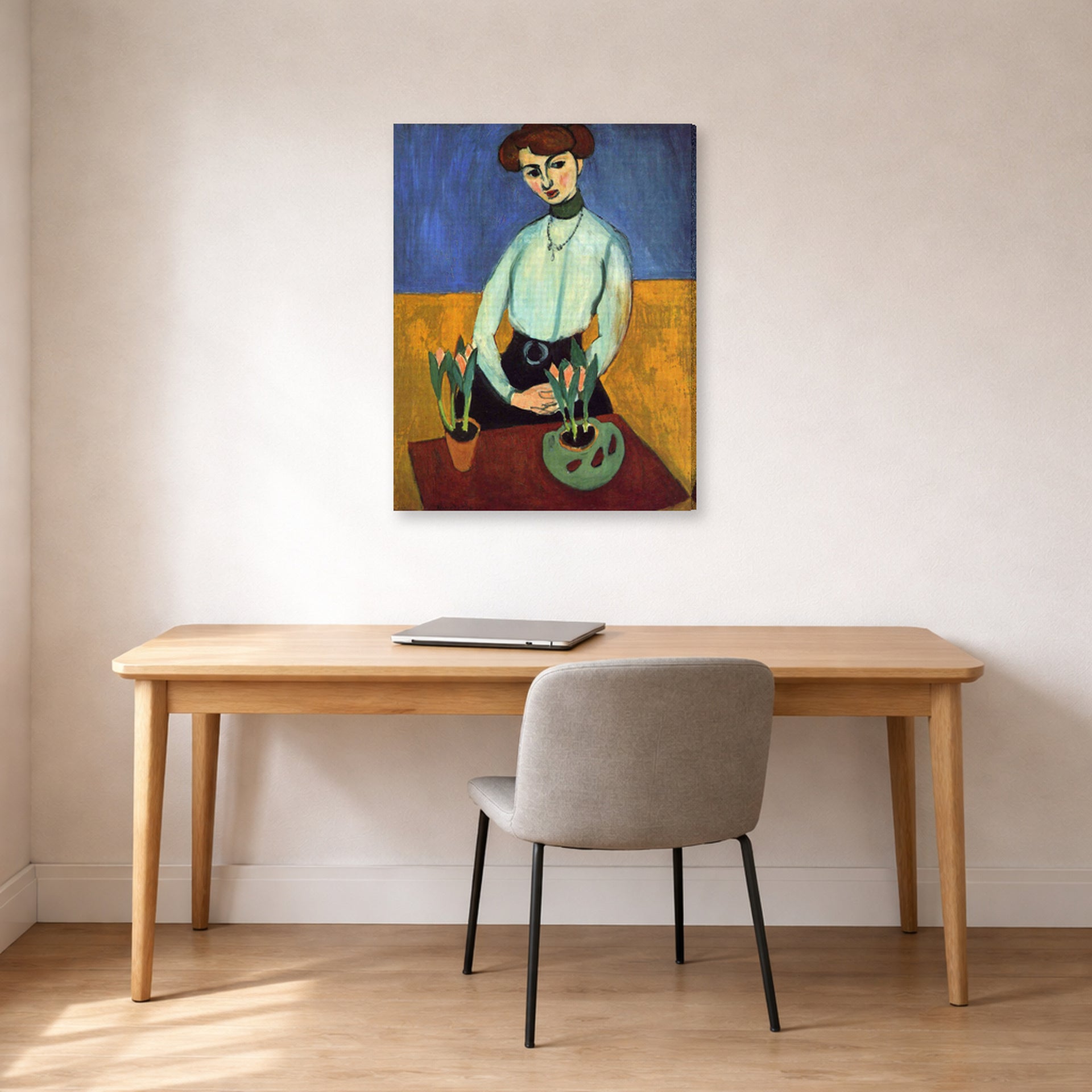 Gallery-wrapped canvas print of Henri Matisse's Girl with Tulips hanging in a home office