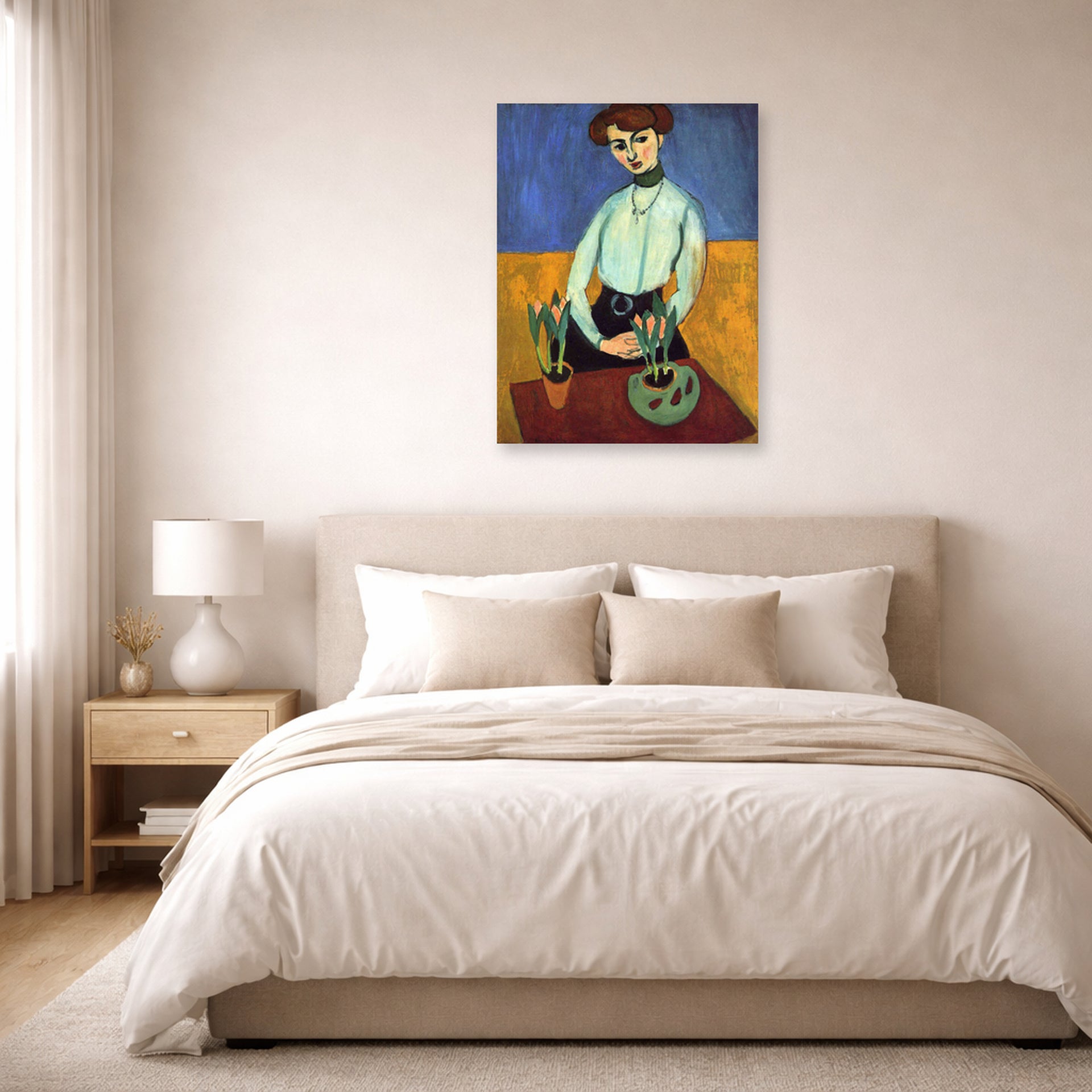 Unframed poster print of Henri Matisse's Girl with Tulips displayed above a bed in a bedroom