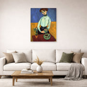 Unframed poster print of Henri Matisse's Girl with Tulips displayed in a living room, view 2