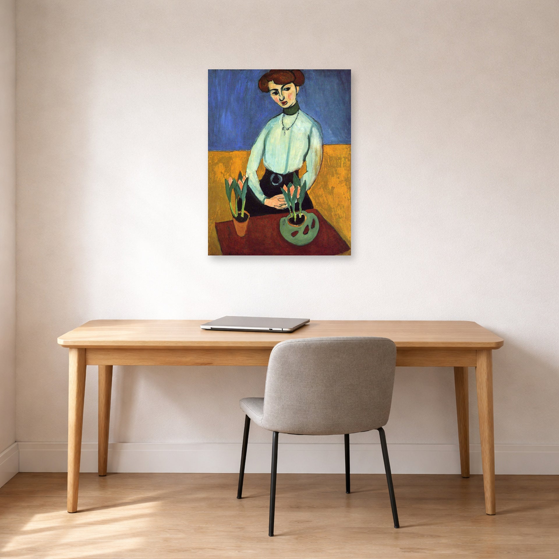 Unframed poster print of Henri Matisse's Girl with Tulips displayed in a home office