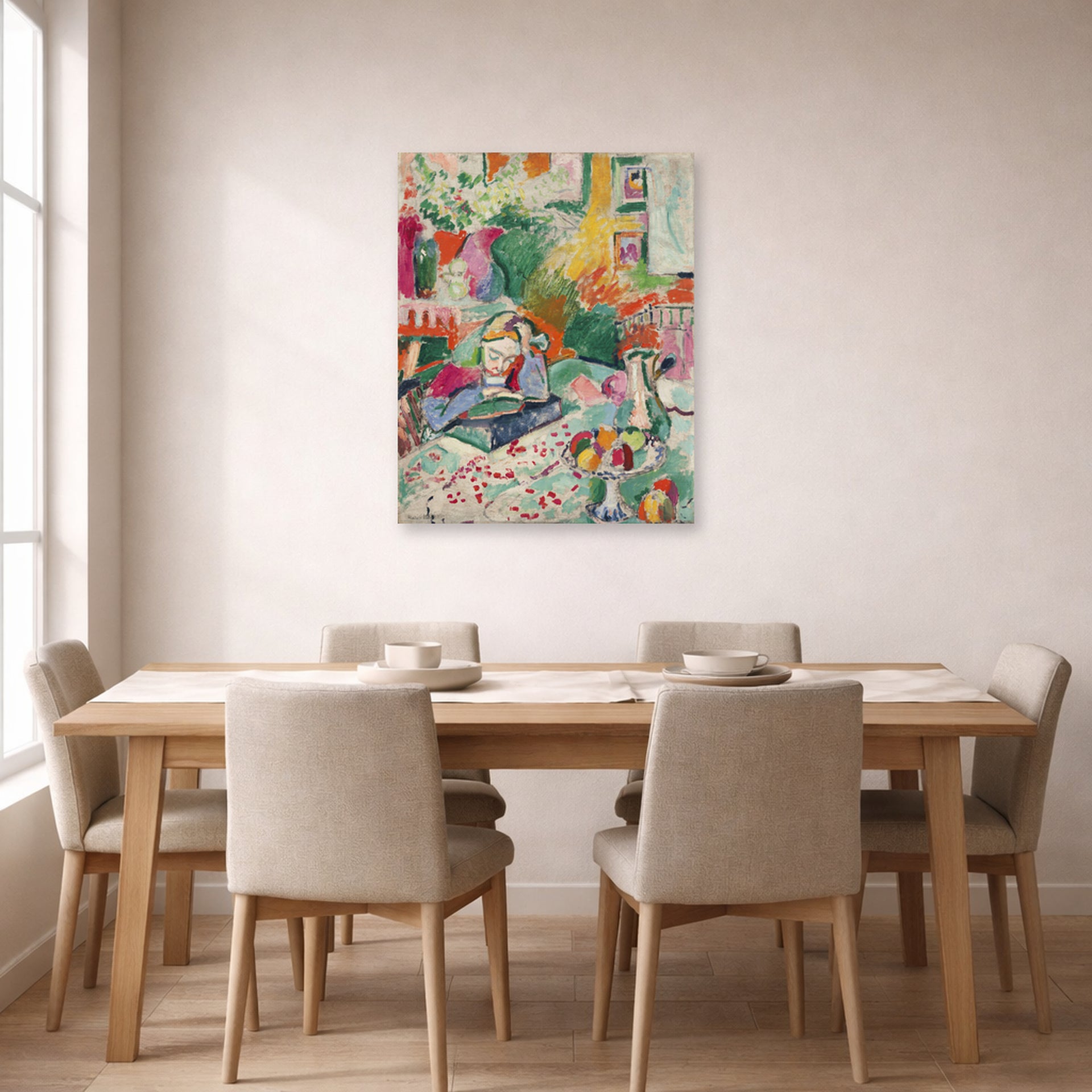Unframed poster print of Henri Matisse's Interior with a Girl Reading displayed on a dining room wall