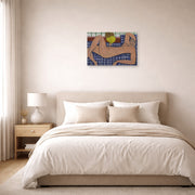 Unframed poster print of Henri Matisse's Large Reclining Nude displayed above a bed in a bedroom
