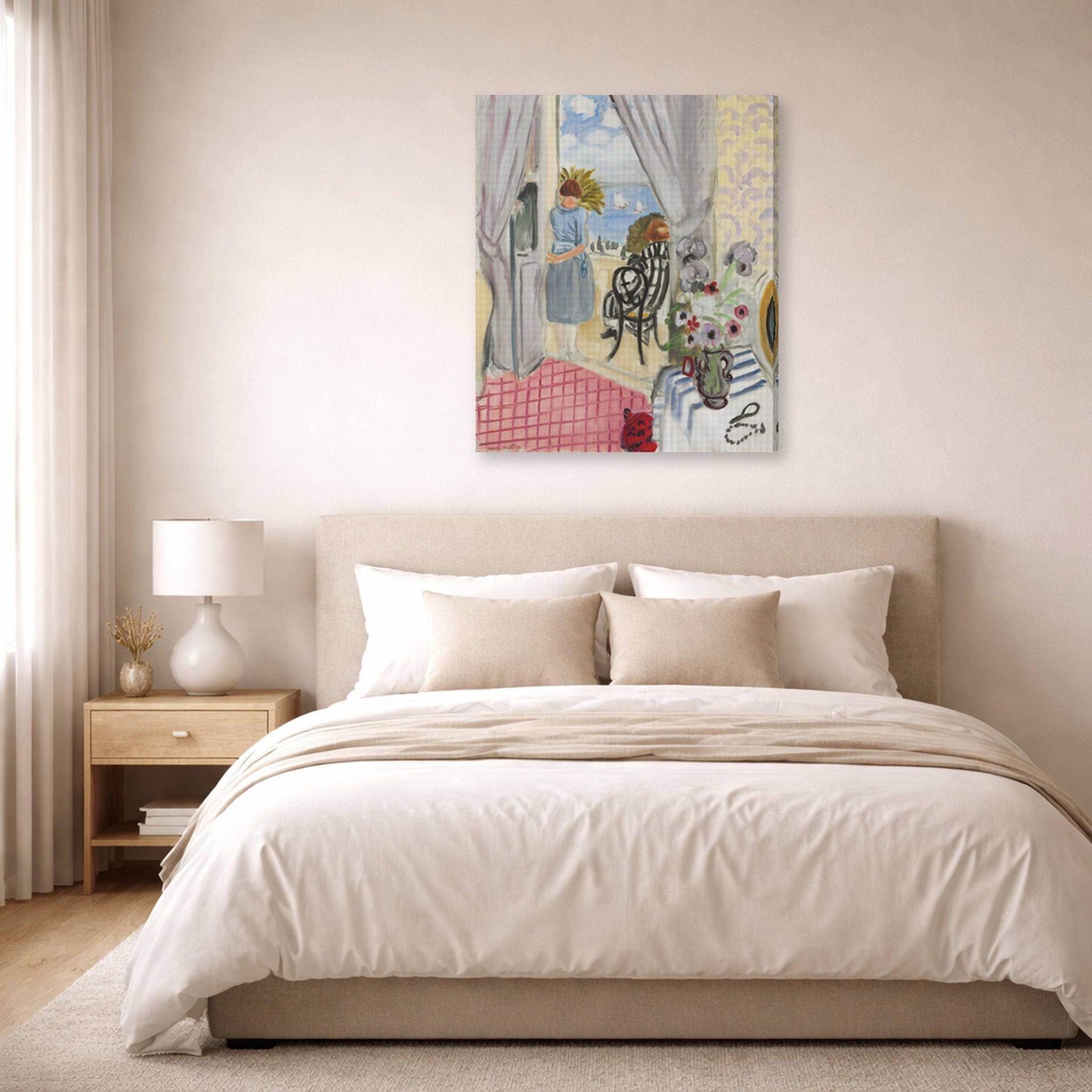 Gallery-wrapped canvas print of Henri Matisse's Les Regates De Nice hanging above a bed in a bedroom