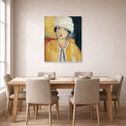 Gallery-wrapped canvas print of Henri Matisse's Lorette with Turban and Yellow Vest hanging on a dining room wall