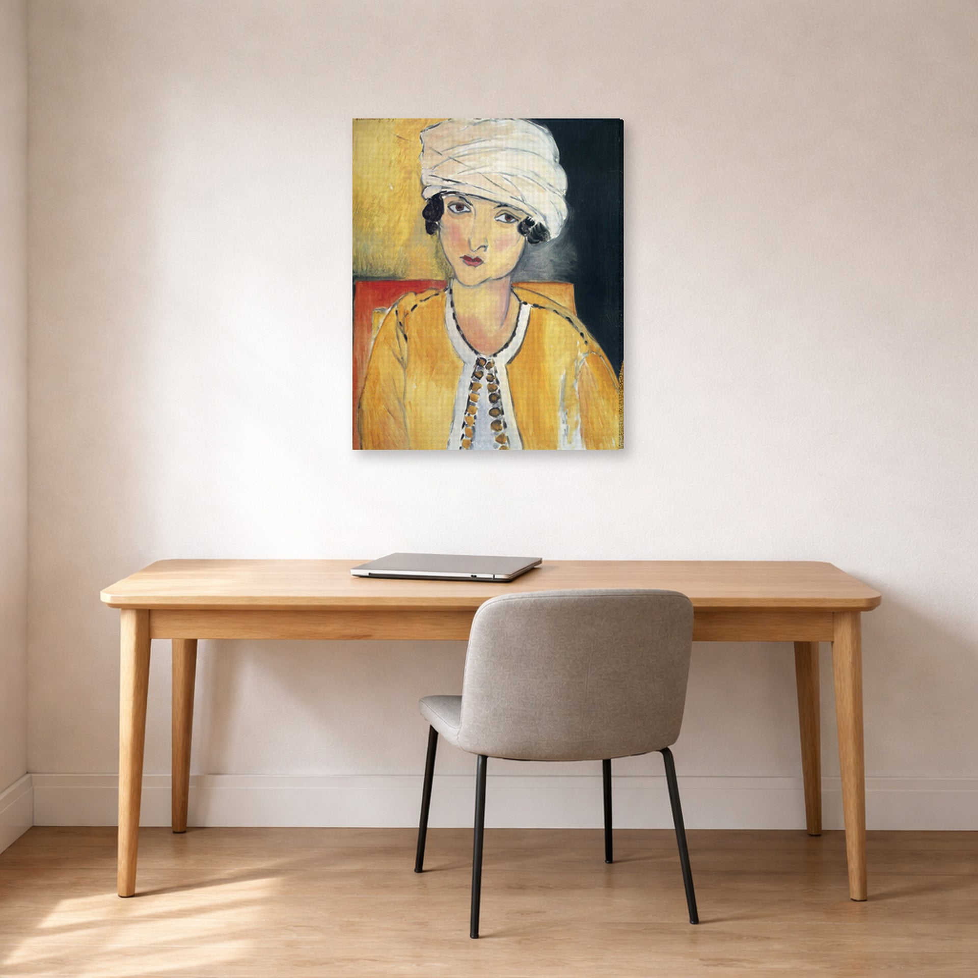 Gallery-wrapped canvas print of Henri Matisse's Lorette with Turban and Yellow Vest hanging in a home office
