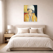 Unframed poster print of Henri Matisse's Lorette with Turban and Yellow Vest displayed above a bed in a bedroom
