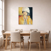 Unframed poster print of Henri Matisse's Lorette with Turban and Yellow Vest displayed on a dining room wall